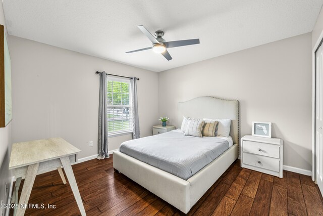 81014 Lockhaven Dr, Yulee, FL 32097 - bedroom with dark wood-style flooring, baseboards, and ceiling fan