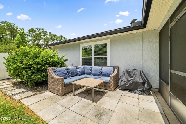 81014 Lockhaven Dr, Yulee, FL 32097 - view of patio featuring an outdoor hangout area
