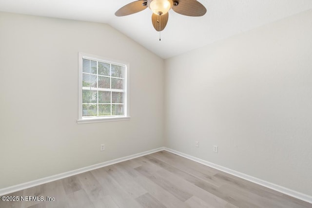 66 W 14th St, Atlantic Beach, FL 32233 - unfurnished room featuring light wood-type flooring, a ceiling fan, lofted ceiling, and baseboards