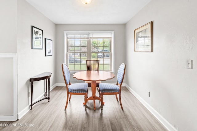 10836 Hawaii Dr S, Jacksonville, FL 32246 - dining area featuring light wood-type flooring and baseboards