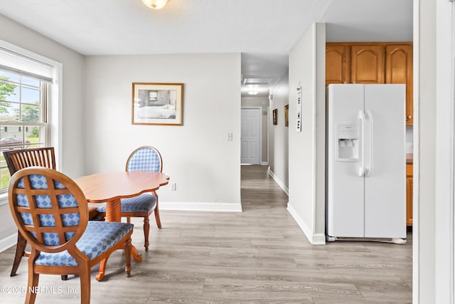 10836 Hawaii Dr S, Jacksonville, FL 32246 - dining room featuring light wood finished floors and baseboards