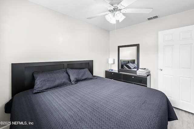 10836 Hawaii Dr S, Jacksonville, FL 32246 - bedroom with wood finished floors and a ceiling fan