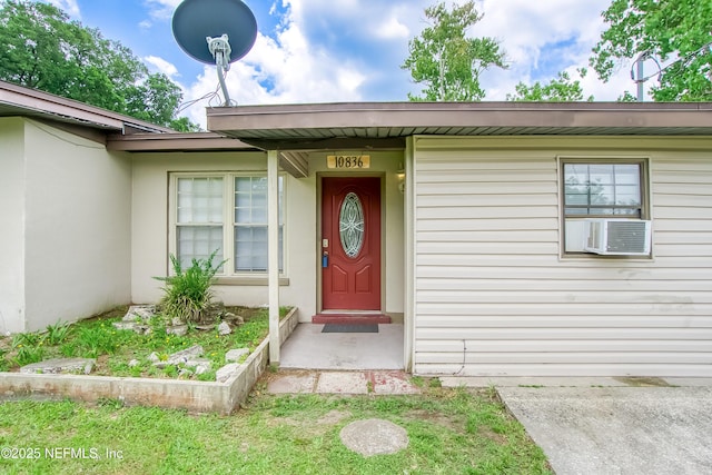 10836 Hawaii Dr S, Jacksonville, FL 32246 - property entrance featuring cooling unit and stucco siding