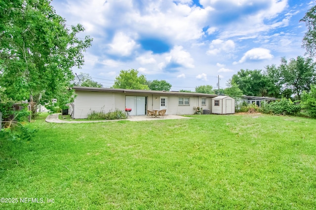 10836 Hawaii Dr S, Jacksonville, FL 32246 - back of property with a patio area, a lawn, and central AC unit