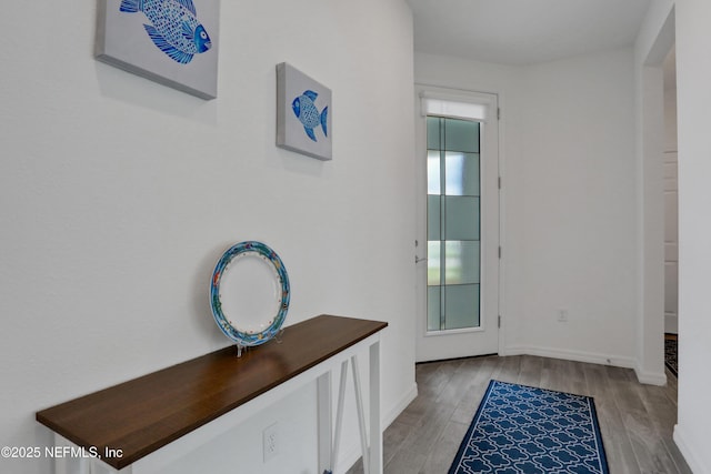564 Jubilee Cir, Yulee, FL 32097 - doorway to outside featuring light wood-style floors and baseboards