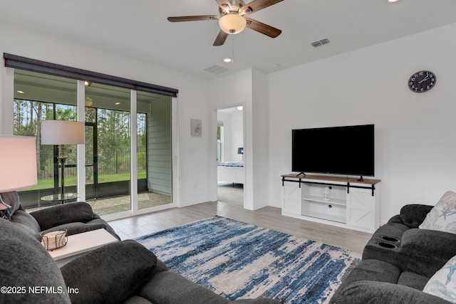 564 Jubilee Cir, Yulee, FL 32097 - living room featuring ceiling fan, wood finished floors, and recessed lighting