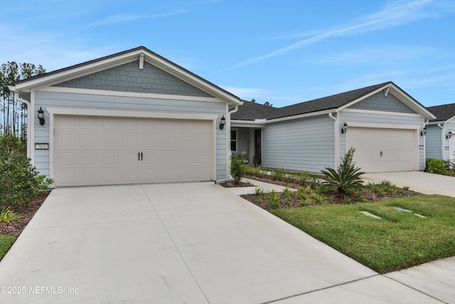564 Jubilee Cir, Yulee, FL 32097 - view of front of house featuring concrete driveway and a garage