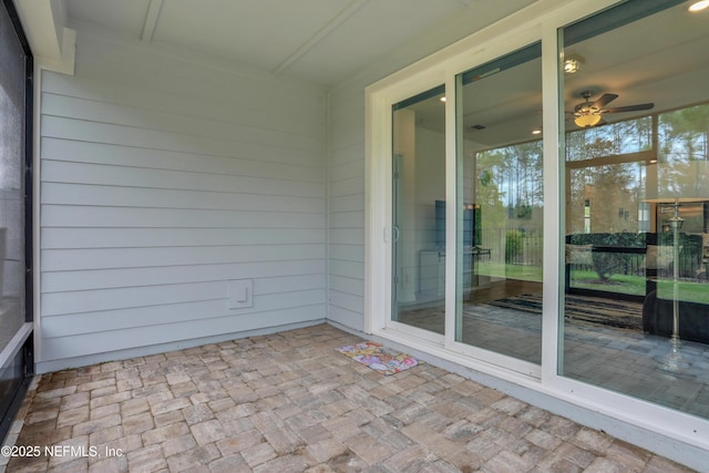 564 Jubilee Cir, Yulee, FL 32097 - unfurnished sunroom with a ceiling fan