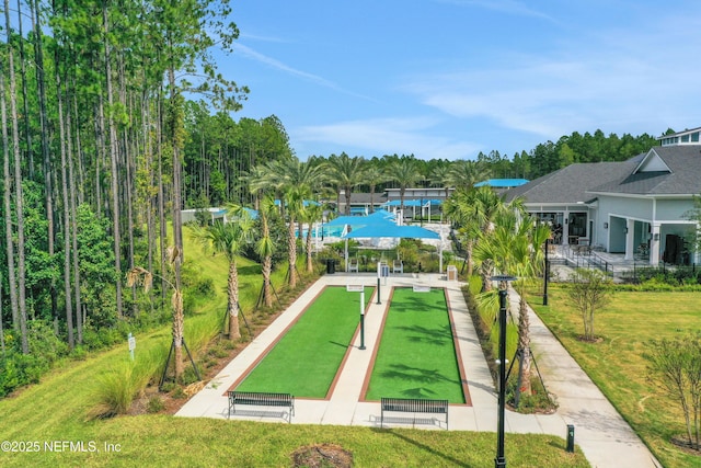 564 Jubilee Cir, Yulee, FL 32097 - surrounding community with a game area and a yard