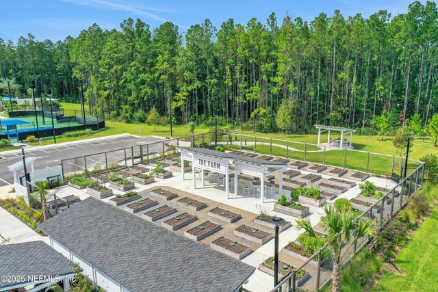 564 Jubilee Cir, Yulee, FL 32097 - view of community with a pergola and a vegetable garden