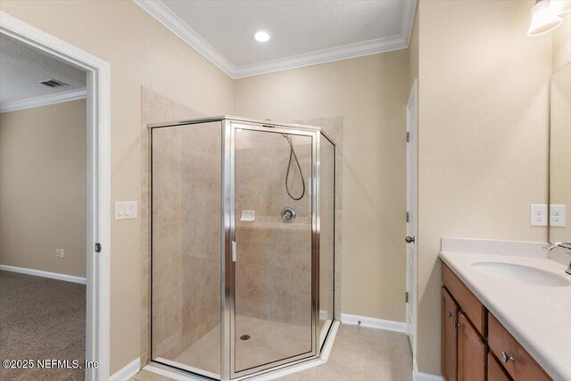 165 Crown Colony Rd, Saint Augustine, FL 32092 - bathroom featuring ornamental molding, vanity, a shower stall, and baseboards