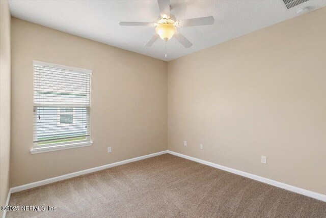 165 Crown Colony Rd, Saint Augustine, FL 32092 - carpeted empty room featuring baseboards and ceiling fan
