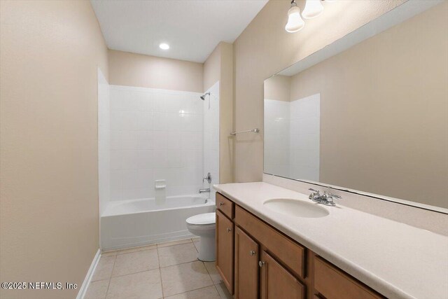 165 Crown Colony Rd, Saint Augustine, FL 32092 - bathroom featuring toilet, vanity, tile patterned flooring,  shower combination, and baseboards