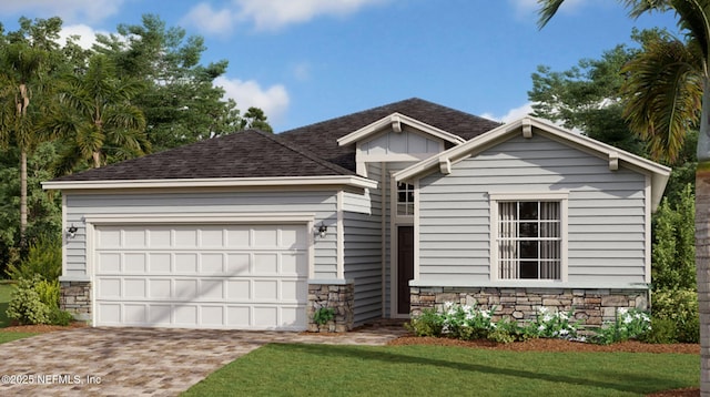 527 Superior Blvd, Saint Johns, FL 32092 - view of front of property with stone siding, decorative driveway, an attached garage, and a shingled roof