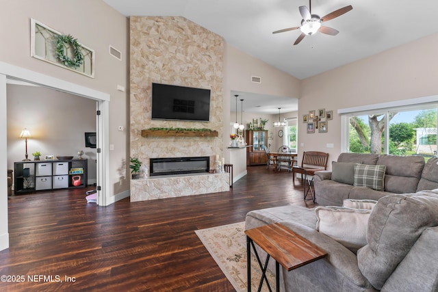 6228 Blue Marlin Dr, Keystone Heights, FL 32656 - living room with ceiling fan, a fireplace, high vaulted ceiling, and wood finished floors