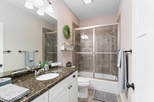 6228 Blue Marlin Dr, Keystone Heights, FL 32656 - full bathroom with toilet, vanity, combined bath / shower with glass door, and tile patterned floors
