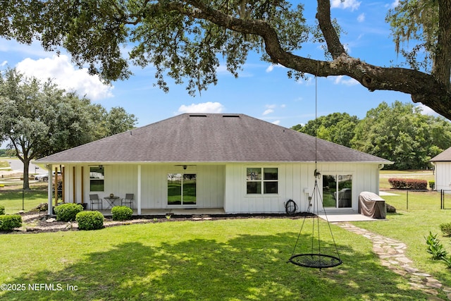 6228 Blue Marlin Dr, Keystone Heights, FL 32656 - back of house featuring roof with shingles and board and batten siding