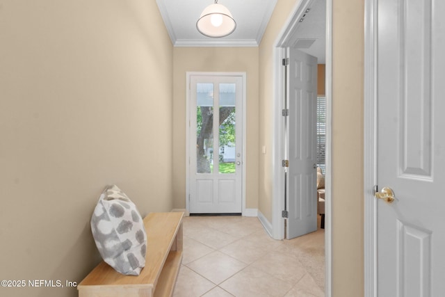 1885 Floyd St, Fernandina Beach, FL 32034 - foyer entrance featuring light tile patterned floors, ornamental molding, and baseboards