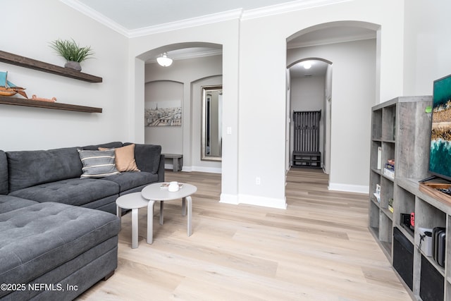 18 Myrtle Brook Bnd, Ponte Vedra, FL 32081 - living room with ornamental molding, light wood-style floors, arched walkways, and baseboards