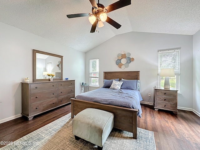 3923 Eden Estate Trl, Middleburg, FL 32068 - bedroom featuring wood finished floors, a textured ceiling, multiple windows, lofted ceiling, and a ceiling fan