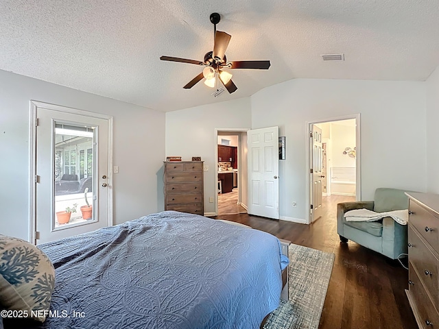 3923 Eden Estate Trl, Middleburg, FL 32068 - bedroom featuring wood finished floors, vaulted ceiling, a textured ceiling, connected bathroom, and a ceiling fan
