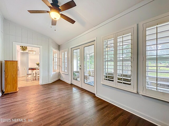 3923 Eden Estate Trl, Middleburg, FL 32068 - empty room featuring lofted ceiling, french doors, dark wood-style flooring, a ceiling fan, and baseboards