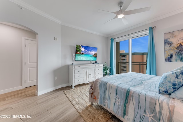1925 S Atlantic Ave Unit 810, Daytona Beach Shores, FL 32118 - bedroom with ornamental molding, arched walkways, wood finished floors, baseboards, and access to exterior