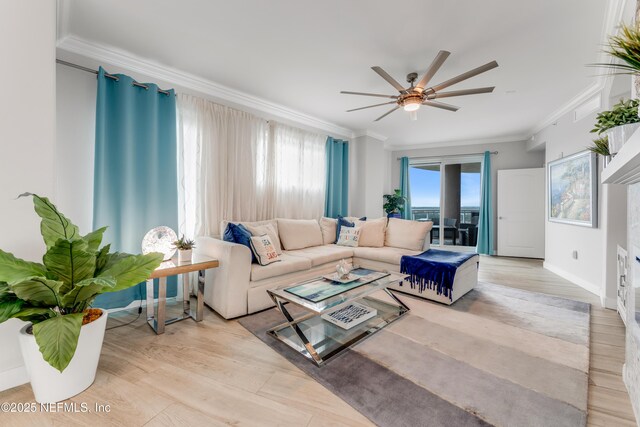1925 S Atlantic Ave Unit 810, Daytona Beach Shores, FL 32118 - living room with a ceiling fan, crown molding, and light wood-style floors
