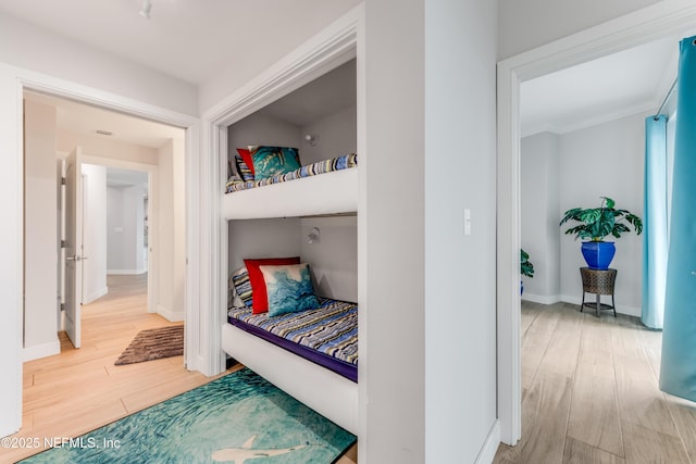1925 S Atlantic Ave Unit 810, Daytona Beach Shores, FL 32118 - bedroom with wood finished floors and baseboards