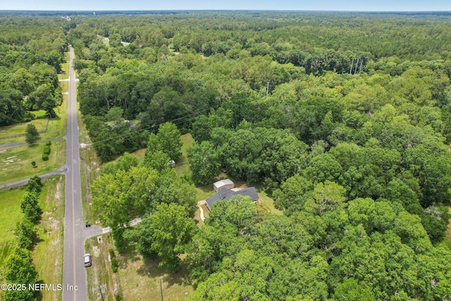2443 SE 150th St, Starke, FL 32091 - aerial view of property and surrounding area with a heavily wooded area