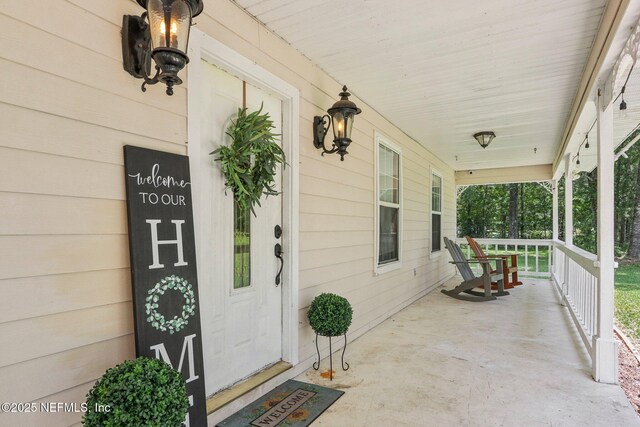 2443 SE 150th St, Starke, FL 32091 - entrance to property featuring a porch