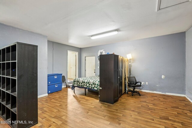 2443 SE 150th St, Starke, FL 32091 - bedroom featuring wood finished floors