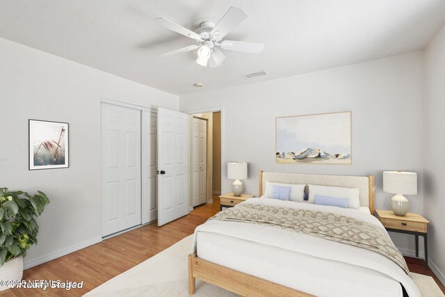 2443 SE 150th St, Starke, FL 32091 - bedroom featuring wood finished floors and a ceiling fan