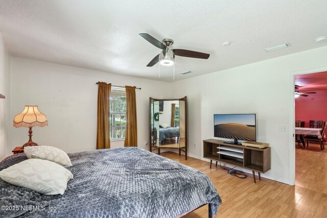 2443 SE 150th St, Starke, FL 32091 - bedroom featuring light wood-style flooring and a ceiling fan