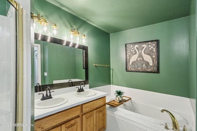 2443 SE 150th St, Starke, FL 32091 - bathroom with a textured ceiling, a garden tub, and double vanity