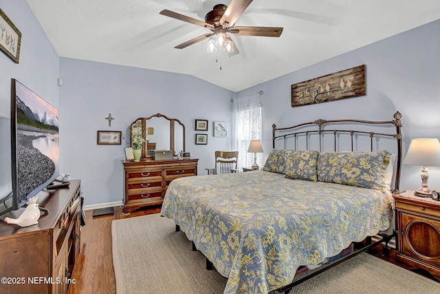 5365 Navigators Way, Jacksonville, FL 32277 - bedroom with wood finished floors, lofted ceiling, and ceiling fan