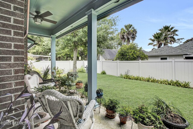 5365 Navigators Way, Jacksonville, FL 32277 - fenced backyard featuring ceiling fan and a patio