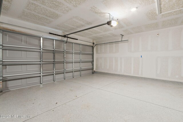 14 Rambling Ln, Palm Coast, FL 32164 - garage featuring a garage door opener