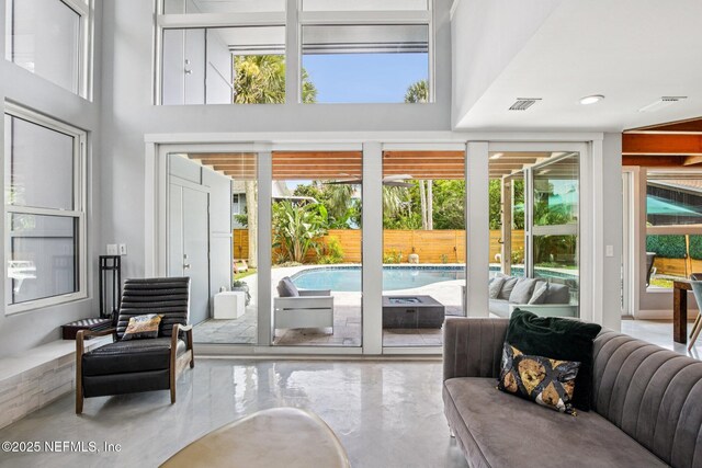 248 11th St, Atlantic Beach, FL 32233 - living area with plenty of natural light and a high ceiling