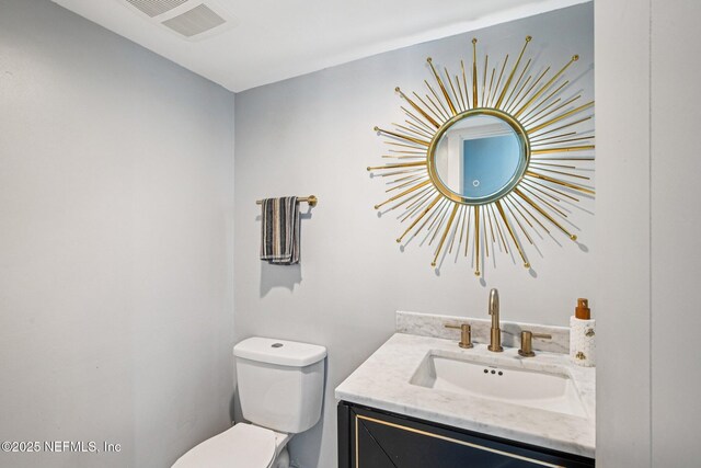 248 11th St, Atlantic Beach, FL 32233 - half bathroom featuring toilet and vanity