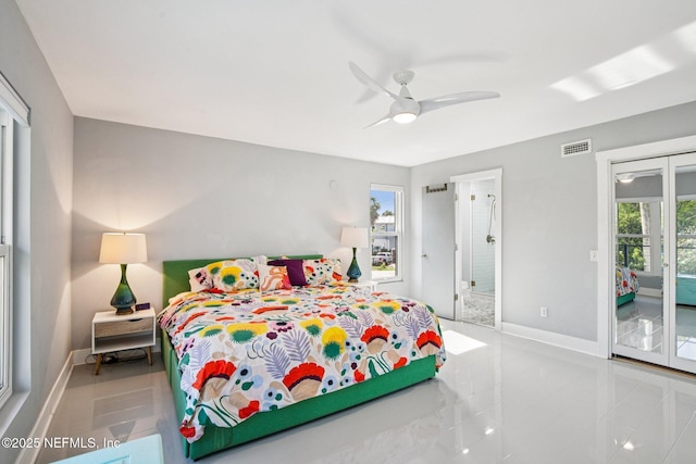 248 11th St, Atlantic Beach, FL 32233 - tiled bedroom with access to exterior and ceiling fan