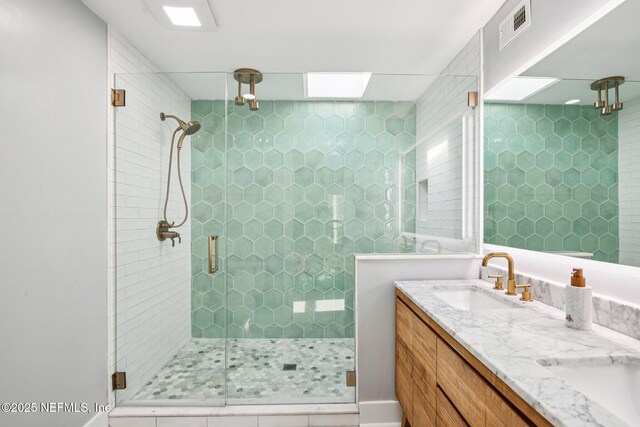 248 11th St, Atlantic Beach, FL 32233 - bathroom with a shower stall and double vanity