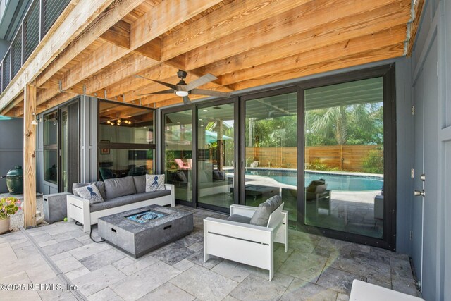 248 11th St, Atlantic Beach, FL 32233 - sunroom / solarium featuring an outdoor living space with a fire pit and a ceiling fan