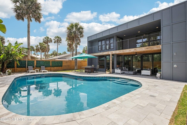 248 11th St, Atlantic Beach, FL 32233 - view of pool featuring an outdoor hangout area, a patio, and a fenced backyard