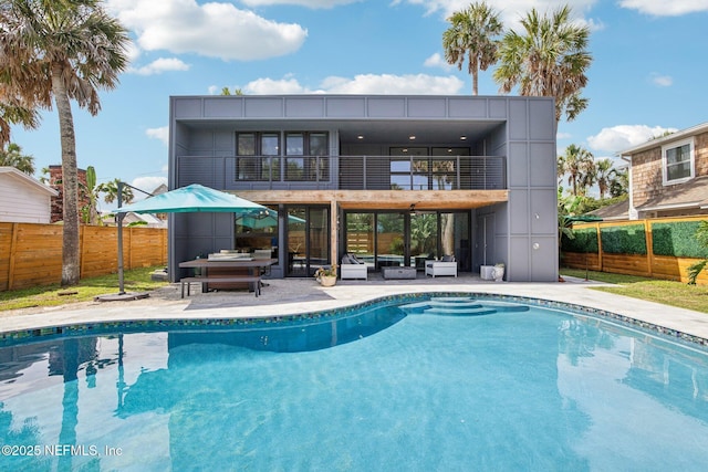 248 11th St, Atlantic Beach, FL 32233 - view of swimming pool featuring a fenced backyard, a patio, and outdoor lounge area