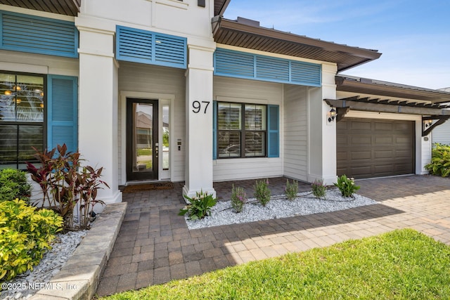 97 Marquesa Cir, Saint Johns, FL 32259 - entrance to property with an attached garage and decorative driveway
