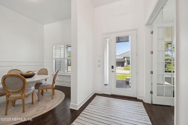 97 Marquesa Cir, Saint Johns, FL 32259 - entryway with dark wood finished floors, wainscoting, and a towering ceiling