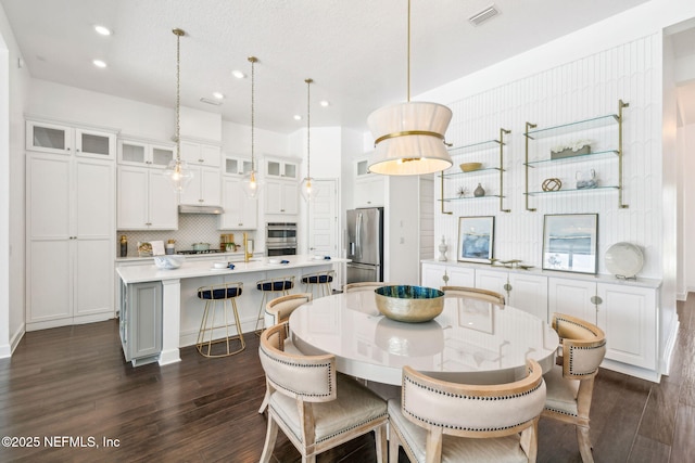 97 Marquesa Cir, Saint Johns, FL 32259 - dining area featuring dark wood-style flooring and recessed lighting