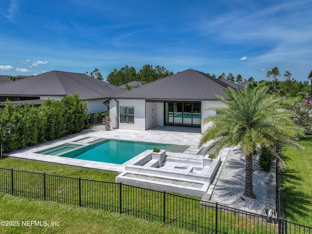 97 Marquesa Cir, Saint Johns, FL 32259 - rear view of house with a patio, a fenced backyard, and a metal roof