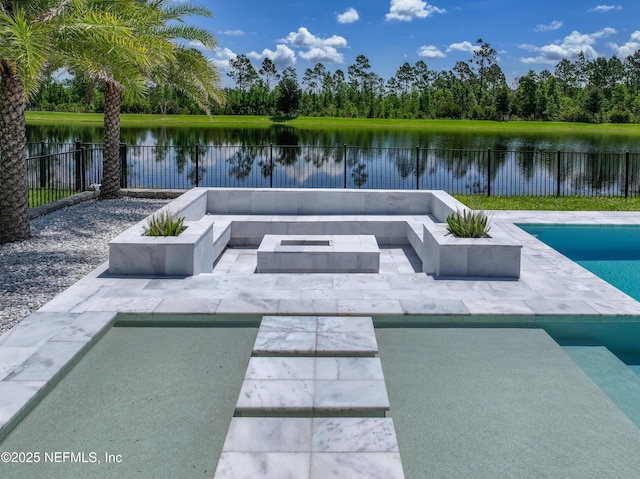 97 Marquesa Cir, Saint Johns, FL 32259 - view of swimming pool with a patio, a water view, a fenced backyard, and an outdoor living space with a fire pit